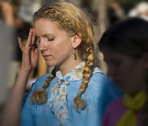 women experiencing the first stage of heat exhaustion leading to heat stroke