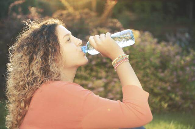 woman drinking water