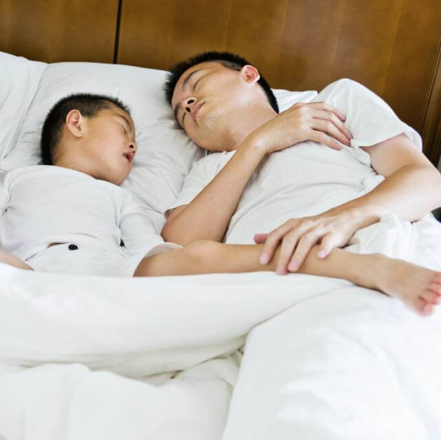 Father and son sleeping