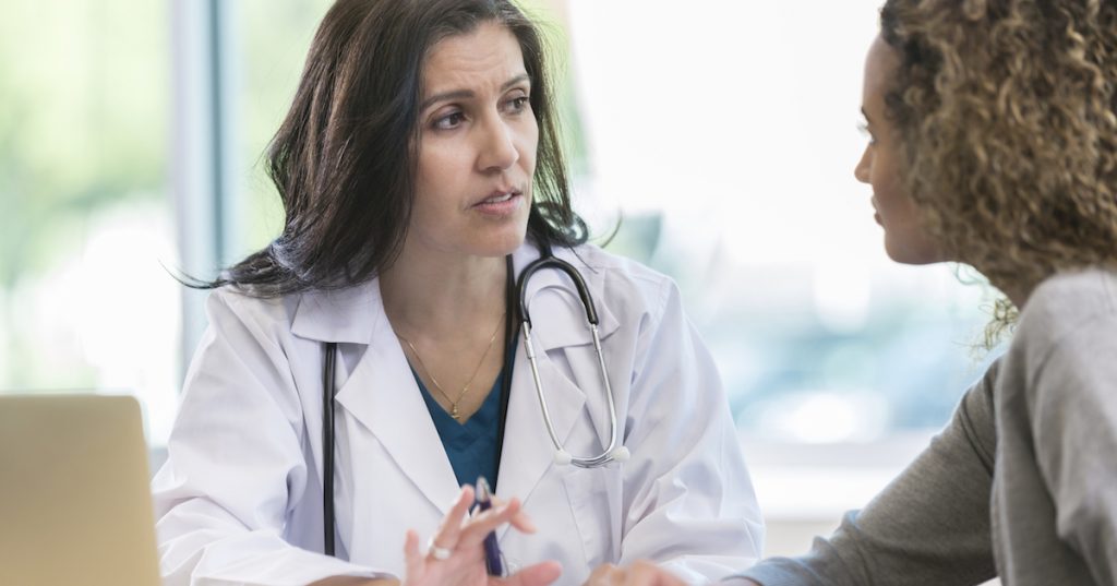 Doctor and patient talking.