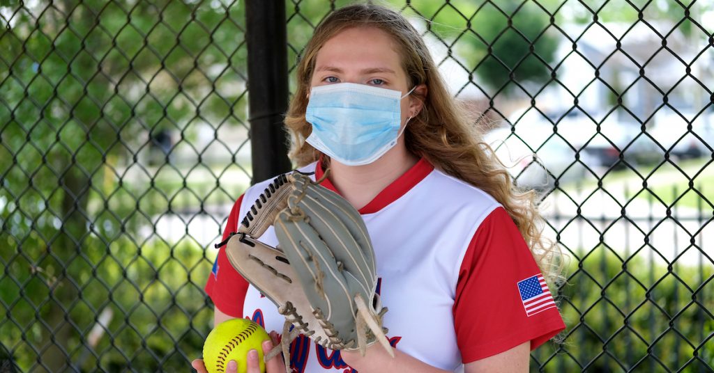 Picture of a softball player in a mask