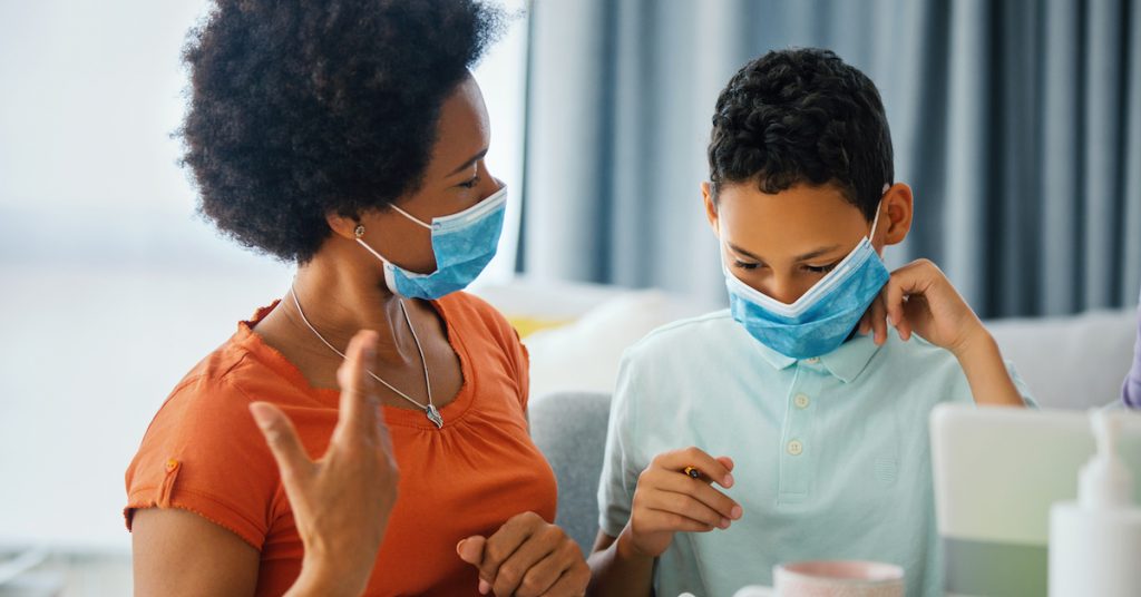 Picture of mother and son in masks