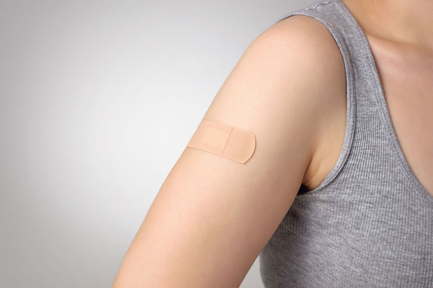 bandaid on arm